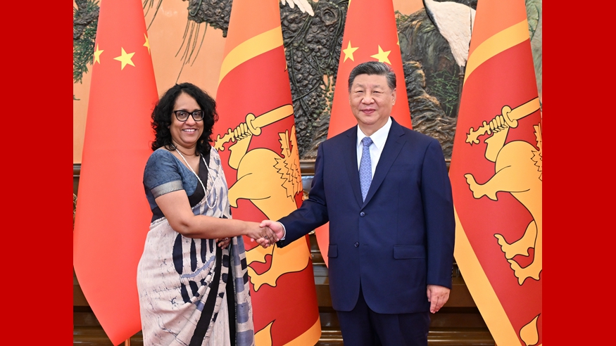 习近平会见斯里兰卡总理阿马拉苏里亚